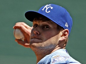 Kansas City Royals starting pitcher Trevor Oaks throws during the first inning of the first baseball game in a doubleheader against the Chicago White Sox Saturday, April 28, 2018, in Kansas City, Mo.