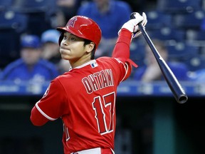 Los Angeles Angels' Shohei Ohtani hits a double during the second inning of a baseball game against the Kansas City Royals, Friday, April 13, 2018, in Kansas City, Mo.