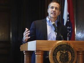 FILE - In this April 11, 2018, file photo, Missouri Gov. Eric Greitens speaks at a news conference in Jefferson City, Mo., about allegations related to an extramarital affair with his hairdresser. Accused of sexual and political misconduct, Greitens is defying calls to resign from top lawmakers in his own party while instead banking on steady support from the voters who backed his populist campaign against "corrupt insiders" and "career politicians."