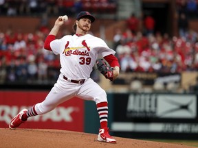 St. Louis Cardinals starting pitcher Miles Mikolas throws during the first inning of a baseball game against the Cincinnati Reds Sunday, April 22, 2018, in St. Louis.