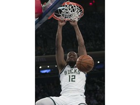 Milwaukee Bucks forward Jabari Parker dunks during the first half of an NBA basketball game against the New York Knicks, Saturday, April 7, 2018, at Madison Square Garden in New York.