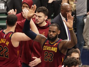 Cleveland Cavaliers forward LeBron James (23) celebrates following Game 4 of an NBA basketball first-round playoff series against the Indiana Pacers in Indianapolis, Sunday, April 22, 2018. The Cavaliers defeated the Pacers 104-100.