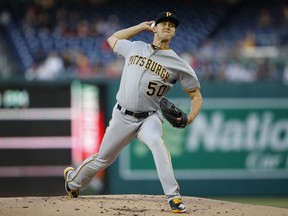 Pittsburgh Pirates starting pitcher Jameson Taillon (50) delivers a pitch against the Washington Nationals, during the first inning of a baseball game at Nationals Park, Monday, April 30, 2018, in Washington.