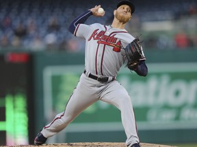 Atlanta Braves starting pitcher Mike Foltynewicz (26) throws against the Washington Nationals during the first inning of a baseball game at Nationals Park, Tuesday, April 10, 2018 in Washington.