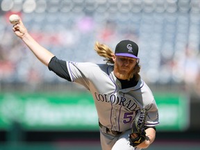 Colorado Rockies starting pitcher Jon Gray delivers a pitch during the first inning of a baseball game against the Washington Nationals, Saturday, April 14, 2018, in Washington.