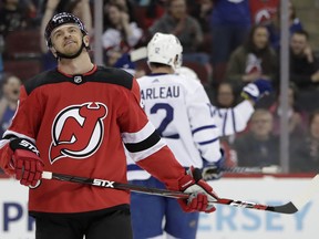 New Jersey Devils right wing Michael Grabner, of Austria, reacts after Toronto Maple Leafs center William Nylander scored a goal during the first period of an NHL hockey game, Thursday, April 5, 2018, in Newark, N.J.