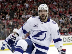 Tampa Bay Lightning right wing Nikita Kucherov, of Russia, celebrates his goal against the New Jersey Devils during the first period of Game 4 of an NHL first-round hockey playoff series Wednesday, April 18, 2018, in Newark, N.J.