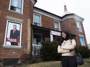 Jelisa Phillips poses for a photograph outside the office of MP Mark Holland in Ajax, Ont., on Tuesday, March 27, 2018. Phillips was confused when she opened the letter from Service Canada and found not a cheque for sickness benefits, but a request for repayment totalling almost $5,000. There was no explanation attached to the invoice, just the dollar figure.