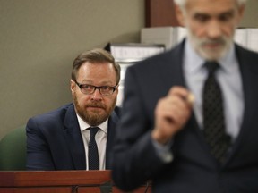 Chris Kenner, business partner of Illusionist David Copperfield, testifies in court, Tuesday, April 17, 2018, in Las Vegas. A Nevada jury got a rare behind-the-scenes look at a David Copperfield disappearing act after a British man claimed he was badly hurt as he participated in a 2013 show. Kenner told jurors that participants don't know in advance that they'll be quickly ushered through hidden passageways during the illusion dubbed "the runaround."