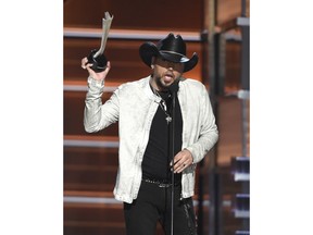 Jason Aldean accepts the award for entertainer of the year at the 53rd annual Academy of Country Music Awards at the MGM Grand Garden Arena on Sunday, April 15, 2018, in Las Vegas.