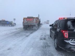 This photo provided by Nebraska State Patrol show stranded motorists on Interstate 80 near Sidney, Neb., Friday, April 13, 2018.  A potent spring storm system that's expected to persist through the weekend raked across the Midwest.  ( Nebraska State Patrol via AP)