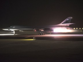 This photo provided by the U.S. Air National Guard shows 34th Expeditionary Bomb Squadron B-1B Lancer aircraft departing from Al Udeid Air Base, Qatar, early Saturday, April 14, 2018.