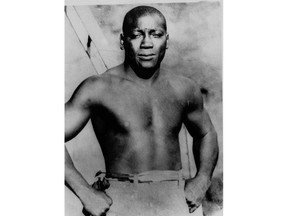 FILE - This undated photo shows boxer Jack Johnson.  President Donald Trump says he's considering "a Full Pardon!" for boxing's first black heavyweight champion more than 100 years after Jack Johnson was convicted by all-white jury of "immorality" for one of his relationships. Trump tweets that the actor Sylvester Stallone called him to share Johnson's story. Trump says Johnson's "trials and tribulations were great, his life complex and controversial."  The president adds: "Others have looked at this over the years, most thought it would be done, but yes, I am considering a Full Pardon!"  (AP Photo/File