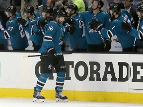 FILE - In this April 16, 2018, file photo, San Jose Sharks center Eric Fehr (16) is congratulated by teammates after scoring a goal against the Anaheim Ducks during the second period of Game 3 of an NHL hockey first-round playoff series in San Jose, Calif. Fehr and Marcus Sorensen spent most of the season toiling in the AHL, just waiting for their chance. That opportunity has arrived in the playoffs for San Jose and those two fourth-line forwards are a major reason why the Sharks swept Anaheim to advance to a second-round series against Vegas. Fehr scored one goal while anchoring the fourth line and Sorensen had three as San Jose's bottom group of forwards that also includes Melker Karlsson matched the scoring output of the entire Anaheim team in the series.