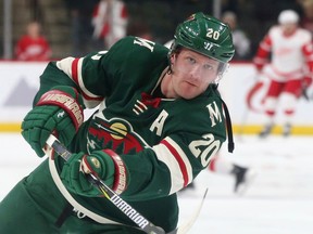 FILE - In this March 4, 2018, file photo, Minnesota Wild's Ryan Suter warms up before an NHL hockey game against the Detroit Red Wings in St. Paul, Minn. Suter, Winnipeg's Dmitry Kulikov, St. Louis' Jay Bouwmeester and Boston's Brandon Carlo are all out for the playoffs as those teams face the reality of being without a key defensemen.