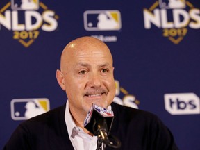 FILE - In this Oct. 11, 2017, file photo, Washington Nationals general manager Mike Rizzo speaks during a news conference before Game 4 of baseball's National League Division Series against the Chicago Cubs in Chicago. The Nationals have agreed to a two-year contract extension with general manager Mike Rizzo. The team announced the deal on Thursday, April 5, 2018, hours before its home opener against the New York Mets.