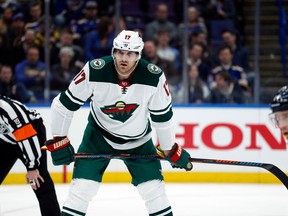 FILE - In this Feb. 6, 2018, file photo, Minnesota Wild's Marcus Foligno waits for a face-off during the second period of an NHL hockey game against the St. Louis Blues, in St. Louis.  For the first time in their careers, brothers Marcus and Nick Foligno both made the NHL playoffs. Marcus has scored a goal and provided strong play from the fourth line for the Minnesota Wild against Winnipeg. Nick, the captain of the Columbus Blue Jackets, has helped his team take the lead on Washington.