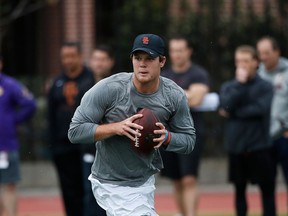 FILE - In this March 21, 2018, file photo, Southern California quarterback Sam Darnold looks to throw a pass during USC Pro Day in Los Angeles. Darnold is visiting the Cleveland Browns, Wednesday, April 4, 2018, who are spending the week meeting with quarterbacks to potentially draft No. 1 overall.