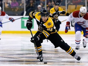 FILE - In this March 3, 2018, file photo, Boston Bruins' Brad Marchand plays against the Montreal Canadiens during the second period of an NHL hockey game in Boston. Marchand is one of about a dozen players in the NHL MVP race.