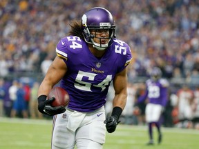 FILE - In this Dec. 17, 2017, file photo, Minnesota Vikings middle linebacker Eric Kendricks returns an interception for a touchdown during the first half of an NFL football game against the Cincinnati Bengals, Minneapolis. The Vikings have signed linebacker Eric Kendricks to a contract extension. The Vikings announced the deal Monday, April 16, 2018, the first day of offseason workouts.