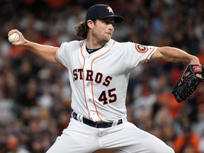 FILE - In this April 7, 2018, file photo, Houston Astros starting pitcher Gerrit Cole delivers during the first inning of a baseball game against the San Diego Padres in Houston. Cole can become the first Astros pitcher since Randy Johnson in 1998 to reach double-digit strikeouts in four straight games when Houston faces Seattle.