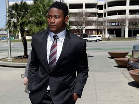 FILE - In this April 12, 2018, file photo, San Francisco 49ers linebacker Reuben Foster arrives at Santa Clara County Superior Court in San Jose, Calif.  The attorney for the ex-girlfriend of Reuben Foster says her client initially lied to authorities when she accused the linebacker of hitting her leading to domestic violence charges. Attorney Stephanie Rickard issued a statement on behalf of Elissa Ennis on Wednesday that says her client can prove the injuries that led to the charges were not caused by Foster.