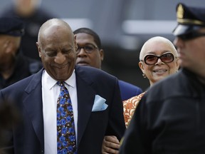 Bill Cosby, left, arrives with his wife, Camille, for his sexual assault retrial, Tuesday, April 24, 2018, at the Montgomery County Courthouse in Norristown, Pa.