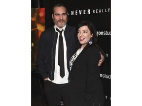 Joaquin Phoenix, left, and Lynne Ramsay attend the premiere of "You Were Never Really Here" at Metrograph on Tuesday, April 3, 2018, in New York.