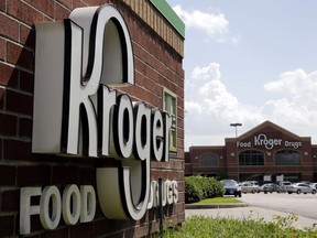 FILE - This June 17, 2014, file photo, shows a Kroger store in Houston. Kroger says it's hiring 11,000 workers for its supermarkets, which is 1,000 more than a year ago. The company said Tuesday, April 10, 2018, that almost 2,000 of the jobs are management positions.