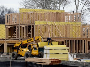 FILE- In this Feb. 26, 2018, file photo, work continues on a new development in Fair Lawn, N.J. On Tuesday, April 17, the Commerce Department reports on U.S. home construction in March.
