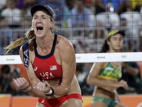 FILE - In this Aug. 17, 2016, file photo, United States' Kerri Walsh Jennings reacts while playing Brazil during the women's beach volleyball bronze medal match of the 2016 Summer Olympics in Rio de Janeiro, Brazil. The five-time Olympian has announced plans for her new beach volleyball circuit that will bring a sports and music festival to eight cities. The p1440 series will open in September in San Jose, California, and then over the next four months visit Las Vegas, San Diego and Huntington Beach, California. Four stops in early 2019 are planned, including Chicago; the others were not announced.