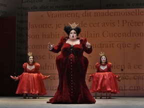 This image released by the Metropolitan Opera shows Stephanie Blythe, center, as the wicked stepmother Mme. de la Haltiere in Massenet's "Cendrillon," with Maya Lahyani, left, and Ying Fang as her daughters. The opera will be broadcast Saturday as the season's  final Live in HD presentation from the Metropolitan Opera.