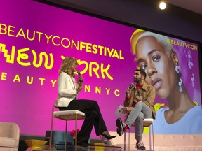 This April 21, 2018 photo shows Paris Hilton, left, appears with moderator Phillip Picardi during the beauty industry event Beautycon Festival NYC in New York. Hilton said that she regrets saying pre-election that women who accused President Donald Trump of sexual misconduct were merely after fame and attention.