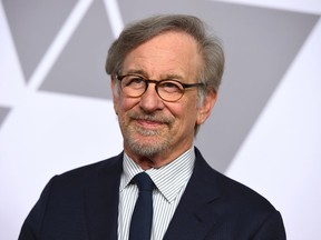 FILE - In this Feb. 5, 2018 file photo, Steven Spielberg arrives at the 90th Academy Awards Nominees Luncheon in Beverly Hills, Calif. Warner Bros. Chairman Toby Emmerich says Tuesday that the legendary filmmaker will produce and may direct the World War II action adventure "Blackhawk," for the studio.