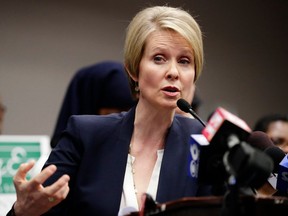 FILE - In this March 26, 2018 file photo, New York Democratic gubernatorial candidate Cynthia Nixon responds to a question during a news conference in Albany, N.Y. Nixon, who has never held an elected office, is challenging Cuomo, a two-term incumbent, for the Democratic Party nomination in September.