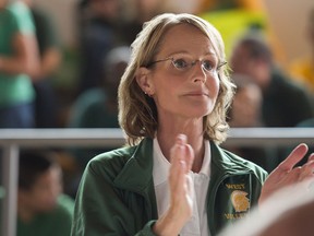 In this image released by LD Entertainment/Mirror, Helen Hunt appears in a scene from "The Miracle Season." The  film follows the true story of Iowa City's West High volleyball team, which reached the state championships after the death of teammate.