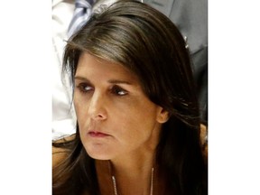 FILE - In this April 9, 2018, file photo, United States Ambassador to the United Nations Nikki Haley sits down at the start of a Security Council meeting at U.N. headquarters. Haley on Tuesday, April 17, fired back against a Trump administration official who said she was suffering from "momentary confusion" when she announced new sanctions against Russia were imminent, saying, "With all due respect, I don't get confused."