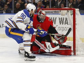 Buffalo Sabres forward Ryan O'Reilly (90) scores on Ottawa Senators goalie Craig Anderson (41) during the first period of an NHL hockey game, Wednesday, April 4, 2018, in Buffalo, N.Y.