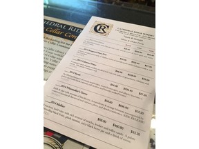 This Aug. 11, 2017 photo shows the wine menu at Cathedral Ridge Winery in Hood River, Ore., in the Columbia River Gorge. Oregon's Columbia River Gorge is known for spectacular waterfalls but it's also famous for wine, with more than 40 wineries in 40 miles (60 kilometers). The Columbia Gorge is a designated American Viticultural Area, a wine grape region distinguished by geographic features.