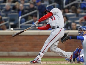 Washington Nationals' Ryan Zimmerman hits a first-inning, three-run home run in a baseball game against the New York Mets, Wednesday, April 18, 2018, in New York.