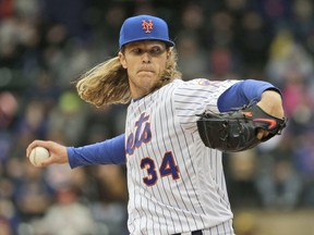 New York Mets starting pitcher Noah Syndergaard throws during the first inning of the baseball game against the Philadelphia Phillies at Citi Field, Wednesday, April 4, 2018, in New York.