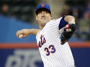 New York Mets' Matt Harvey (33) delivers a pitch during the first inning of a baseball game against the Milwaukee Brewers, Saturday, April 14, 2018, in New York.