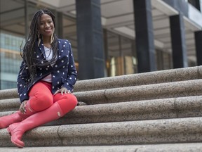 In this Wednesday, April 4, 2018 photo, Arlene Pitterson poses for a photo in New York. Council-member Rafael Espinal has proposed legislation that would bar employers from requiring employees to check and respond to non-emergency emails, texts and other electronic communications sent outside of regular work hours, or retaliating against them if they didn't. The bill would be intended to make life better for people like Pitterson, a marketing and event planning consultant in Brooklyn, who recalled one boss routinely pestering her with late-night emails, then grew upset when she didn't reply.