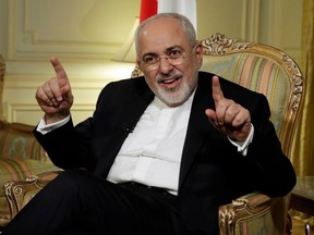 Iran's Foreign Minister Mohammad Javad Zarif is interviewed by The Associated Press, in New York, Tuesday, April 24, 2018. Zarif is warning the Trump administration that pulling out from the Iran nuclear deal would undermine talks with North Korea by proving that America reneges on its promises.