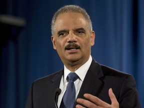 FILE - In this March 4, 2015, file photo, then-Attorney General Eric Holder speaks at the Justice Department in Washington. During remarks at the National Constitution Center, Monday, April 23, 2018, Holder questioned the recent arrests of two black men in a Philadelphia Starbucks.