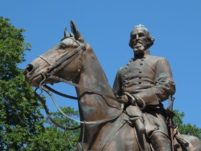 FILE - In this Aug. 18, 2017, file photo, a statue of Confederate Gen. Nathan Bedford Forrest sits in a park in Memphis, Tenn. The Republican-dominated House in Tennessee has voted to punish the city of Memphis for removing Confederate monuments by taking $250,000 away from the city that would have been used for planning a bicentennial celebration in 2019.