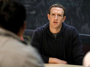 FILE - In this Nov. 9, 2017, file photo, Facebook CEO Mark Zuckerberg meets with a group of entrepreneurs and innovators during a round-table discussion in St. Louis. As Zuckerberg prepares to testify before Congress over Facebook's privacy fiasco, public-relations experts who have prepped CEOs before have plenty of advice on handling the hot seat.