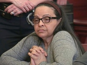 FILE - In this Thursday, March 1, 2018 file  image from video, Yoselyn Ortega, a trusted nanny to a well-to-do family, listens to court proceedings during the first day of her trial, in New York. Ortega attacked 6-year-old Lucia Krim and her 2-year-old brother Leo, on Oct. 25, 2012, placing their bloodied bodies in a bathtub before their mother, Marina Krim, came home to discover the horrifying scene. Jurors must now decide whether she was too mentally ill to be held responsible for the crime. Her murder trial began March 1. Testimony ended Monday, April 16.  (WYNY-TV/Pool Photo via AP, File)