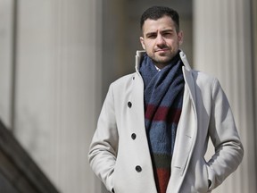 In this April 2, 2018 photo, Qutaiba Idlbi poses for a picture at Columbia University in New York where he is a sophomore. A scholarship program that Columbia created to support Syrians who, like Idlbi, were displaced by war, could be jeopardized by the travel restrictions that President Trump has imposed on citizens of that country.