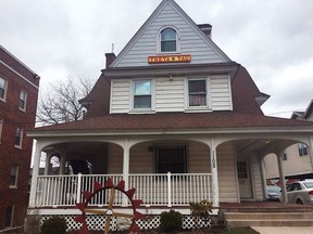 This Wednesday, April 18, 2018 photo shows the Theta Tau fraternity house in Syracuse, N.Y.   Syracuse University Chancellor Kent Syverud announced the fraternity was suspended over videos with racist, sexist content.  Syverud, described the video involving members of Theta Tau, a professional engineering fraternity, as racist, anti-Semitic, homophobic, sexist and hostile to people with disabilities. He said the videos were turned over to the school's Department of Public Safety for possible disciplinary or legal action.